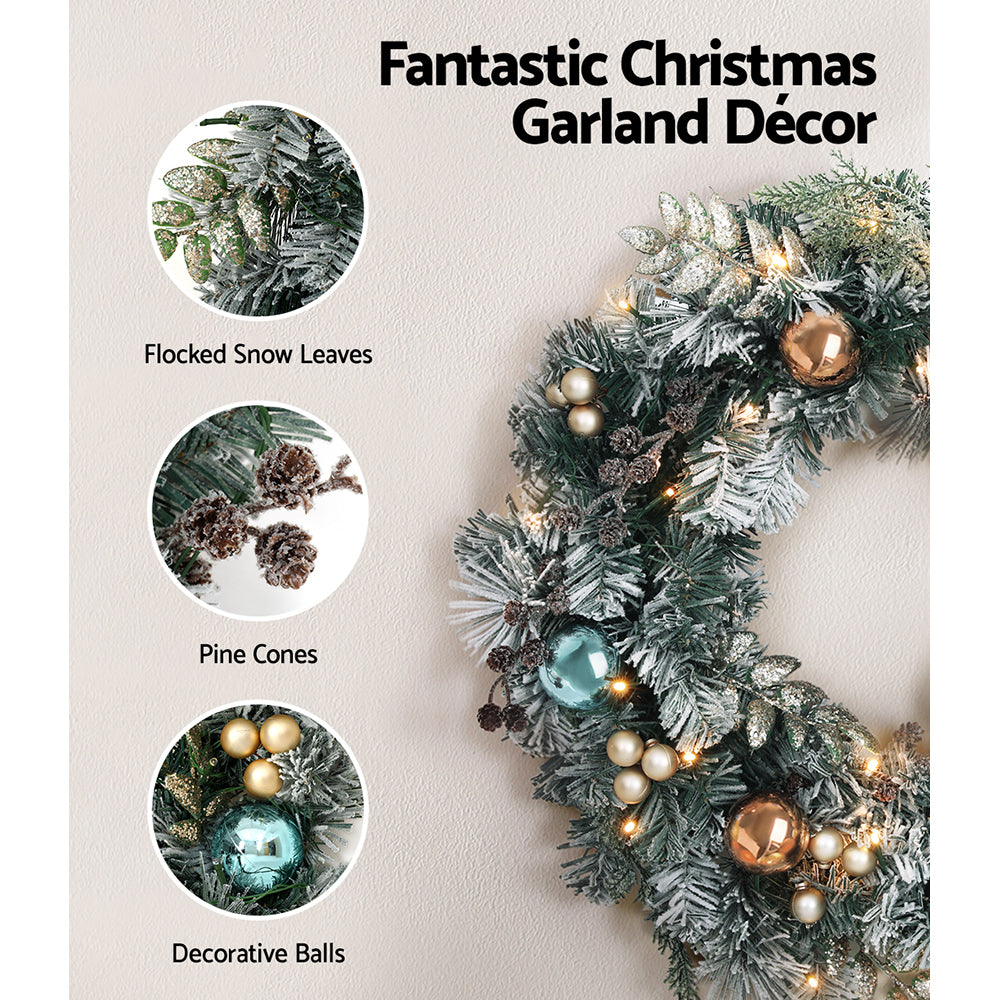 jingle-jollys-60cm-christmas-wreath-with-led-lights-snowy-garland-xmas-decor www.mallsonline.com.au