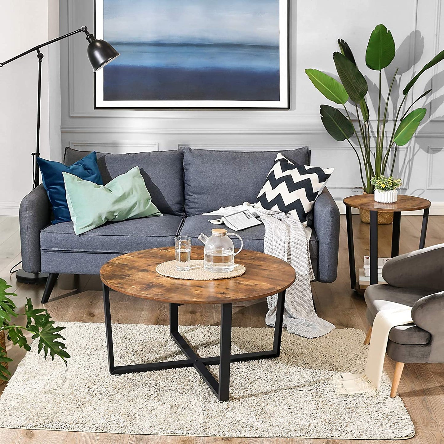 round-coffee-table-rustic-brown-and-black at www.mallsonline.com.au