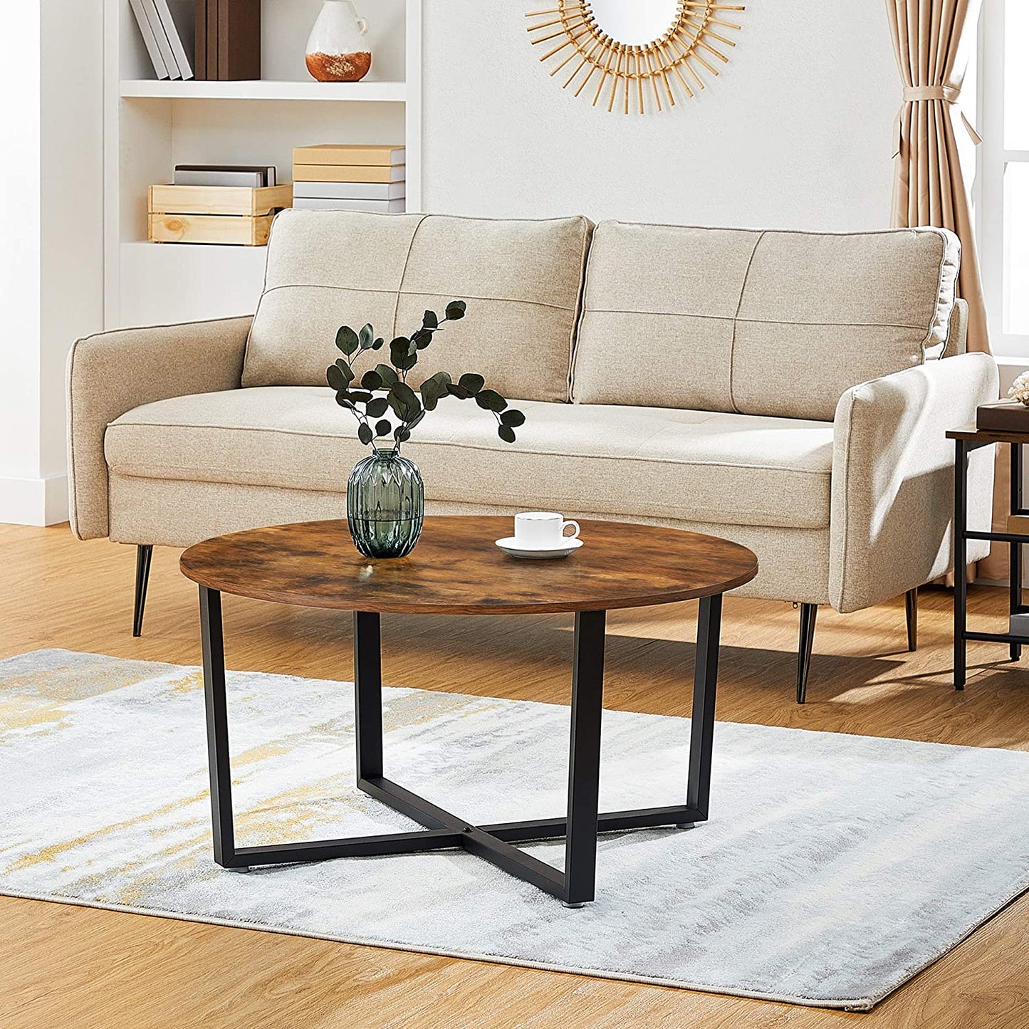 round-coffee-table-rustic-brown-and-black at www.mallsonline.com.au
