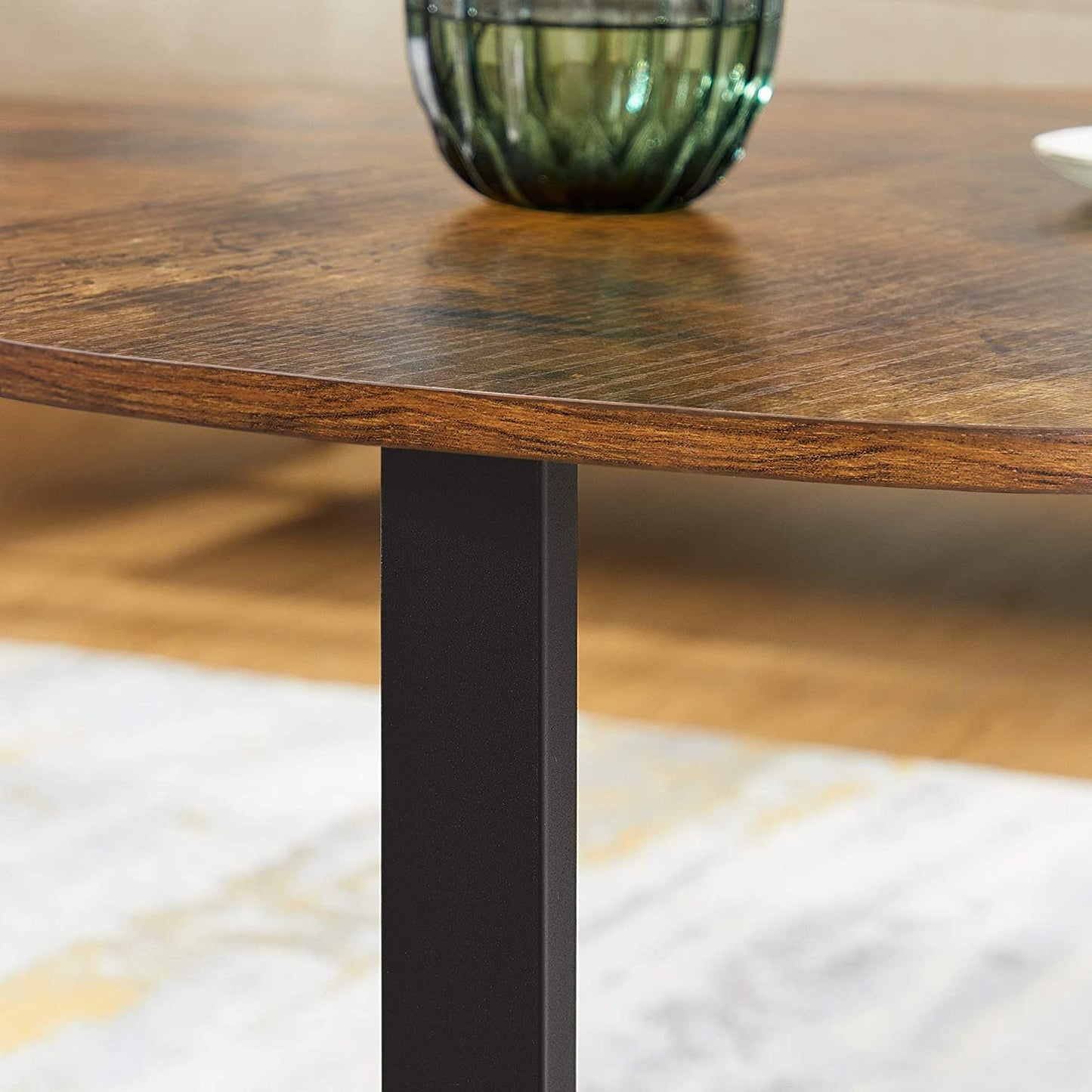 round-coffee-table-rustic-brown-and-black at www.mallsonline.com.au
